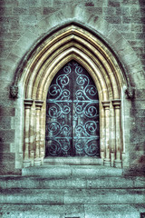Fototapeta premium Old arched doors richly decorated HDR