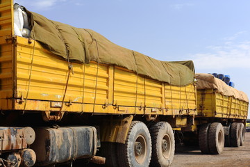 Salt-loaded trucks. Afrera-Ethiopia. 0169