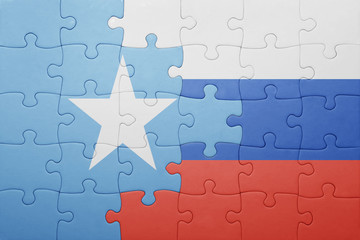 puzzle with the national flag of russia and somalia