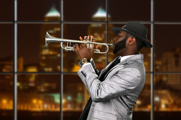 Fototapeta premium Musician in city concert hall.
