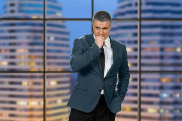 Evening of distressed businessman.