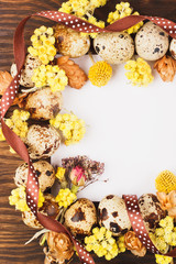 Frame from quail eggs and decorations
