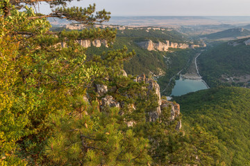Fototapeta na wymiar Mountain landscape on a summer morning. Crimea view from Mangup Kale plateau in the vicinity and the pond Mangup Kale