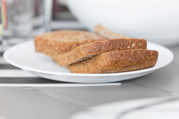 sliced brown bread on a plate