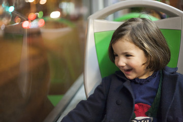 Little girl having fun at urban bus © WH_Pics