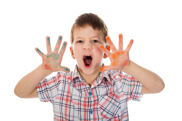 Little boy with paint stained hands