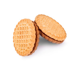 Sandwich biscuits with chocolate filling on a white background