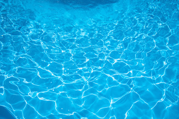 Fototapeta na wymiar Rippled water in swimming pool