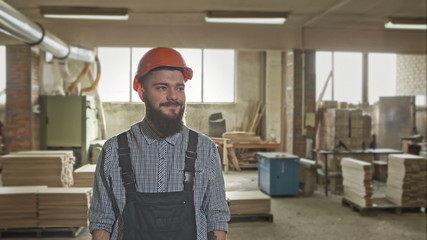 Carpenter worker wearing protective gear. RAW video record.