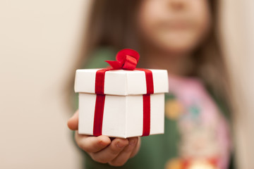 Gift Box In Children Hands