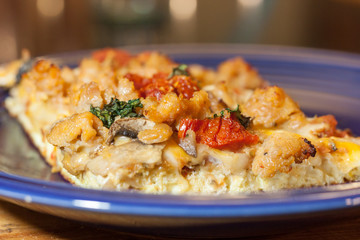 Delicious and mouth watering homemade pizza on blue plate