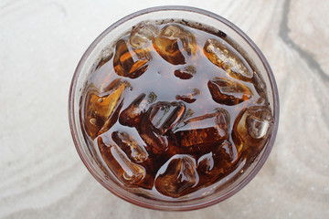 Cola with ice cubes