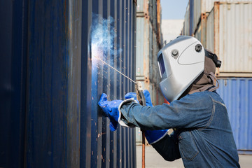 Worker welding