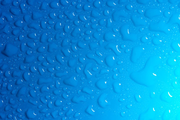 background of water drops on blue
