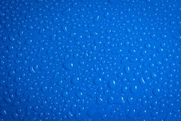background of water drops on blue