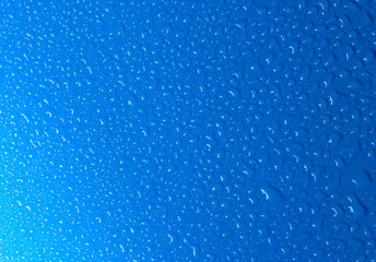 background of water drops on blue