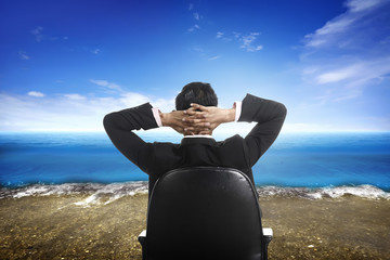 Fototapeta premium Successful business man on the beach