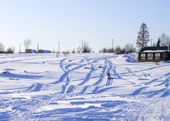 village landscape in the winter on a grief, a landscape 
