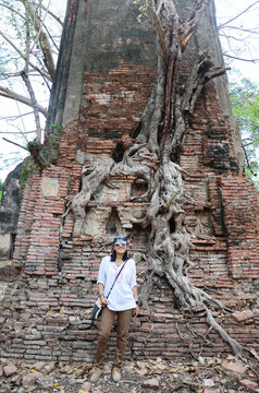 Thai woman portriat with Ruins of ancient building