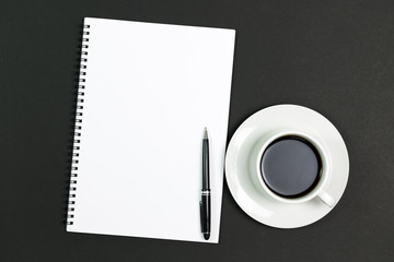 Blank notepad with coffee