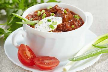 Hungarian cuisine. Goulash served in a white tureen