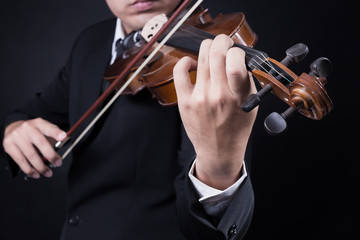 musician playing violin