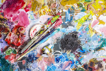 Palette of artist  and brushes with  knife