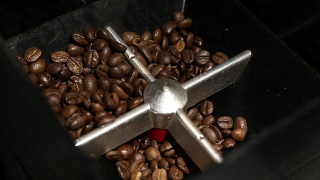 Fresh coffee beans grinder top view