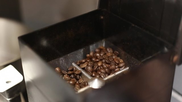 Fresh coffee beans grinder top view