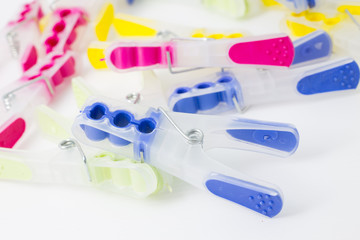 Colorful clothespin clothes peg or clothes pin isolated in white background.