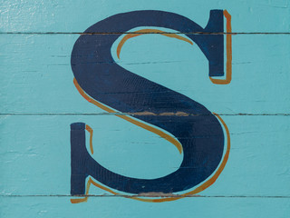 Wooden alphabet block, letter S