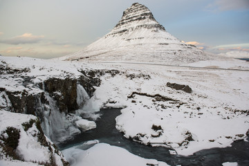 Beauty Kirkjufell mountain with water falls at winter, Iceland