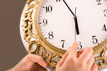Hand drawing a flower near pencils