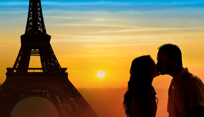 Backlit loving couple honeymoon in Paris