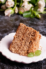homemade caramel cake in white plate.