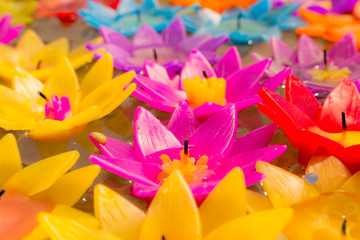 Flower candles floating in water