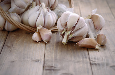 bunch of garlic on a wooden table