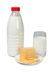 Cheese with milk in glass on white background