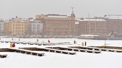 Snowfall and blizzard in Helsinki. North Harbour is hardly visible through snow wall