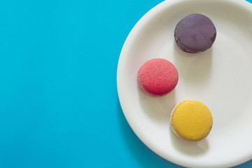 colorful macaron on white plate