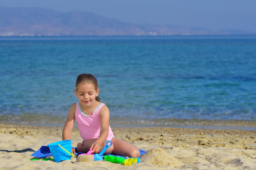 Real toddler girl enjoying her summer vacation