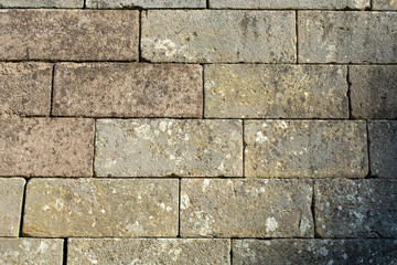 gray wall of stone blocks - background, texrure