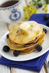 Pancakes with blueberry and maple syrup