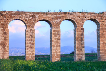 Fototapeta na wymiar Remains of an ancient Roman aqueduct between Acre and Nahariya