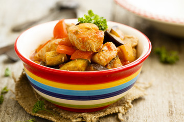 Pork stew with pepper, eggplant and tomatoes