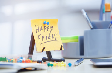 Friday text on adhesive note