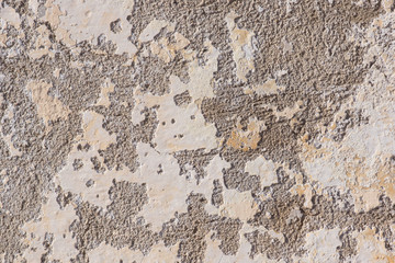 Concrete wall after sandblasting and peeling paint removed in preparation for painting