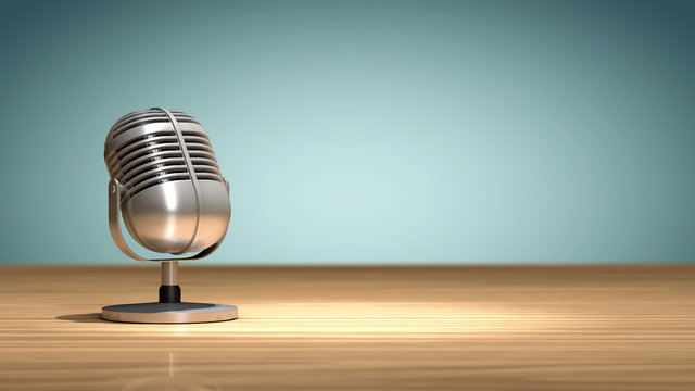Microphone vintage posé sur une table en bois, orienté et prêt pour enregistrer