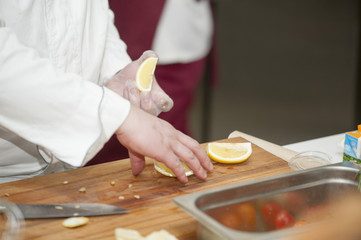 Cook knife lemon slices.