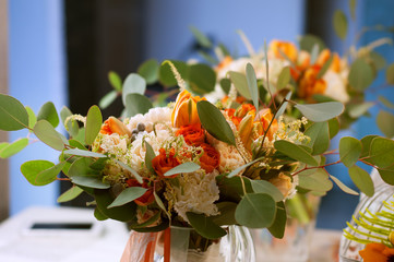 Obraz na płótnie Canvas Spring flowers. Orange bouquet with carnations, tulips, roses 